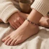 Bracelet de cheville en cuivre, cœurs pleins et ajourés, porté à la cheville Bracelet de cheville en cuivre, cœurs pleins et ajourés, porté à la cheville