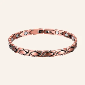 Bracelet de cheville en cuivre rosé, maillons en X croisés, pastilles rondes claires et fermoir à clip Bracelet de cheville en cuivre rosé, maillons en X croisés, pastilles rondes claires et fermoir à clip