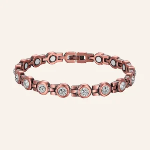 Chaîne de cheville en cuivre rosé à pierres rondes transparentes, pastilles métalliques et fermoir à clip Chaîne de cheville en cuivre rosé à pierres rondes transparentes, pastilles métalliques et fermoir à clip