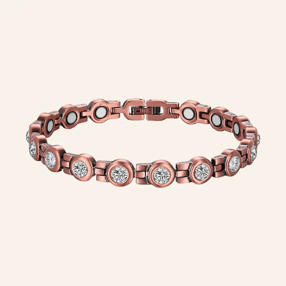 Chaîne de cheville en cuivre rosé à pierres rondes transparentes, pastilles métalliques et fermoir à clip Chaîne de cheville en cuivre rosé à pierres rondes transparentes, pastilles métalliques et fermoir à clip