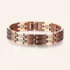 Bracelet à maillons plats en cuivre rosé mat, deux bandes centrales gravées de fins chevrons
