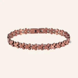 Bracelet articulé en cuivre rosé, maillons quadrilobés et pastilles claires, fermoir à clip