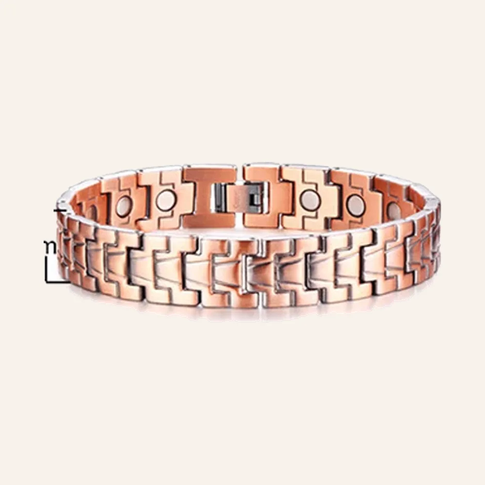 Bracelet en cuivre rosé mat à maillons cruciformes imbriqués, aimants visibles aux extrémités