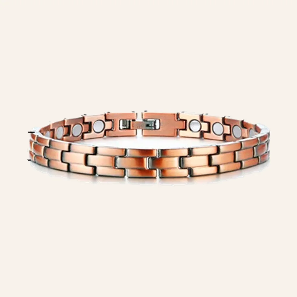 Bracelet à maillons rectangulaires en cuivre mat rosé, pastilles rondes claires et fermoir à clip