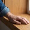 Bracelet en cuivre tressé, fils de cuivre tressés en natte, porté au poignet Bracelet en cuivre tressé, fils de cuivre tressés en natte, porté au poignet