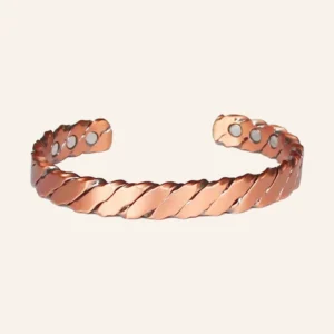 Bracelet jonc en cuivre torsadé en spirale, avec pastilles rondes aux deux extrémités